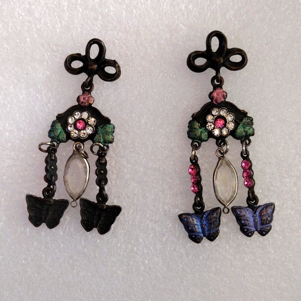 Don Lin dangling butterflies and crystal earrings.